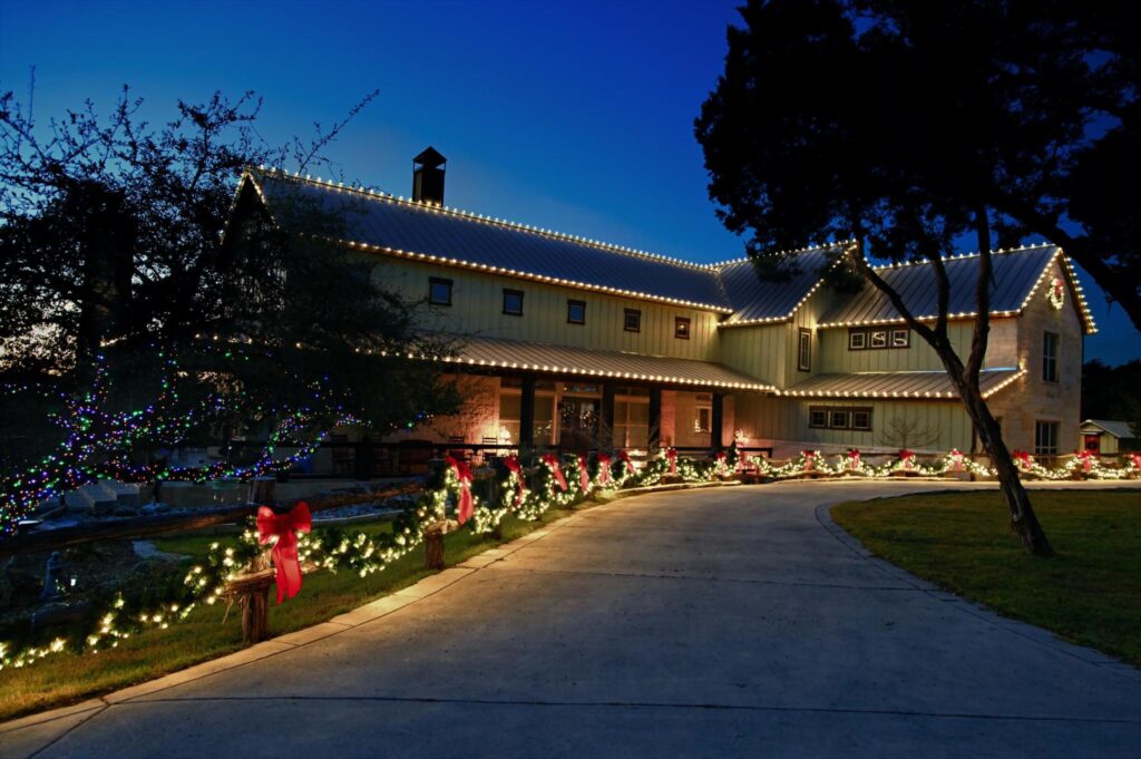 house outlined with white christmas lights